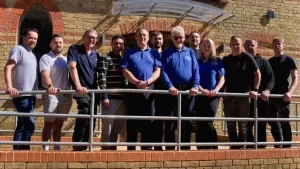 Team photo outside the new training centre
